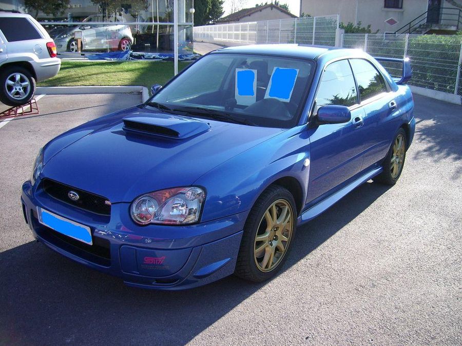 donc subaru wrx STI kit prodrive de 2004...  29900 kms...garantie totale 1an ( je la garderai pas cela ça c'est sur )